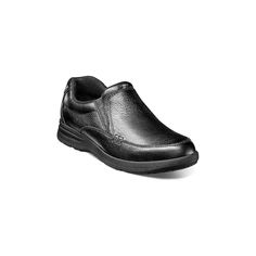 Men's Nunn Bush Cam Moc Toe Slip On Walking Shoes Black Tumbled 84696-007 The Nunn Bush Cam Moc Toe Slip On features an unadorned vamp and a combination smooth and grain leather upper. The shoe’s profile is a stand out for the modern cut of the wedge EVA sole while inside a Memory Foam footbed with a Comfort Gel heel pad guarantees that it feels just as good as it looks. Leather sourced from a tannery with a Gold or Silver rating for environmental responsibility by the independent auditing group, the Leather Working Group. Naturally soft genuine leather upper Breathable, fully padded mesh linings for exceptional moisture management and 360-degree padding Our Comfort Gel footbed combines a molded Memory Foam insole with our signature Comfort Gel heel pod for superior cushioning and all-day Eva Sole, Walking Shoes, Tumbling, Shoes Black, Leather Working, Mens Casual Shoes, Black Shoes, Casual Shoes, Grain