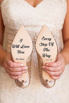 a bride holding her wedding shoes with the words i every step off the way