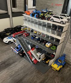 toy cars and trucks are stacked on top of each other