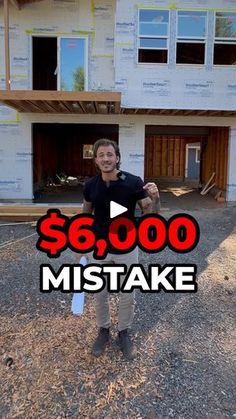 a man standing in front of a house with the words $ 6, 000 on it