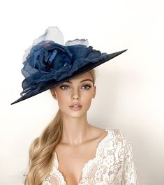 Navy Wedding hat, mother of the bride hat, navy blue Wide Brim Fascinator, Kentucky Derby Hat, Royal Ascot Hat, Derby Race Day Hat, luncheon This stunning navy blue large brim hat is decorated with a beautiful flower in the same shades. This blue hat is perfect for the Kentucky derby, Ascot races, weddings or any special occasion. Secure by headband. If you can choose the side of the head were you like to wear the fascinator, can send me a mail. ** PROCESSING TIME: 5 -7 business days. ** DELIVER Mother Of The Bride Blue Hats, Luxury Blue Headpieces For Races, Elegant Navy Hat For Evening, Elegant Navy Hats With Curved Brim, Elegant Navy Hat With Curved Brim, Elegant Navy Wide Brim Hat, Fitted Navy Wide Brim Hat, Navy Fitted Wide Brim Hat, Navy Formal Hat With Curved Brim