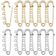 six pairs of gold and silver metal clips