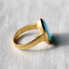 D E T A I L S - Material: Sterling silver 925 Stone: Aqua Chalcedony The fit: True to US ring size Finish: Smooth and Gold Plated to a high shine S H I P P I N G & P R O D U C T I O N - My current production time is 2-6 business days, which means after those days are up, your order ships! I make everything custom to order, by hand, but I promise you it's worth the wait! R U S H - M Y - O R D E R - If you're in a rush to get your pretty new pieces, please send me a message and I'll let you kn Polished Open Emerald Ring As A Gift, Polished Open Emerald Ring For Gift, Fine Jewelry Turquoise Open Ring Gift, Gold Turquoise Ring With Bezel Setting For Gift, Emerald Open Ring With Bezel Setting As Gift, Gift Polished Finish Open Emerald Ring, Polished Open Emerald Ring, Gift Turquoise Ring With Polished Finish, Gold Turquoise Ring With Bezel Setting As Gift