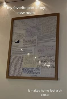 there is a framed newspaper on the wall with words above it that read, my favorite part of my new room