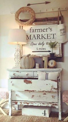 an old dresser with a sign above it that says farmer's market