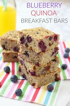 blueberry quinoa breakfast bars stacked on top of each other