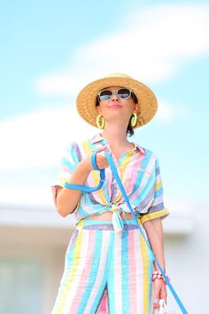 The Quintessential Palm Springs Outfit - Kelly Golightly Palm Springs Mini Backpack Outfit, Palm Springs Mini Outfit, Summer Retro Outfits, Palm Springs Editorial, Rainbow Jumpsuit, Pastel Pallet, Palm Springs Sweatshirt