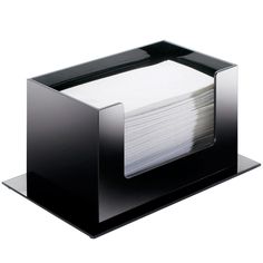 a stack of papers sitting inside of a black box