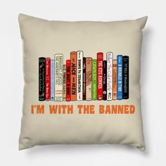 a pillow with books on it that says, i'm with the banned