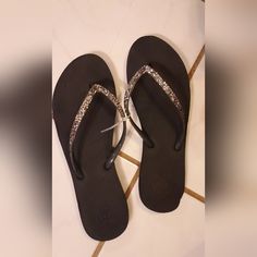 Reef Slippers Sparkles. Size 10 Never Used Kept In Storage But Has Some Hawaii Sand On Bottom Os Sole And Indentions From Storage. Reef Slippers, Reef Shoes, Black Silver, Hawaii, Slippers, Size 10, 10 Things, Silver, Women Shopping