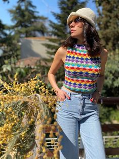 Multicolor Hippie Crop Top, Multicolor Sleeveless Hippie Crop Top, Multicolor Sleeveless Crochet Top For Vacation, Bohemian Multicolor Cropped Tops, Multicolor Cropped Bohemian Tops, Bohemian Multicolor Granny Square Top, Multicolor Crop Top For Beach, Colorful Hippie Beach Tops, Colorful Hippie Tops For Beach