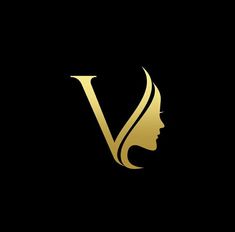 a woman's face with the letter v on it in gold and black background