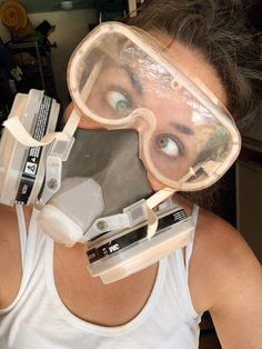 a woman wearing goggles and safety gear