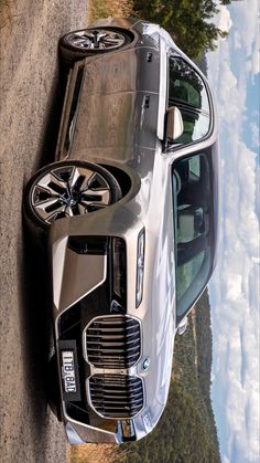 an suv parked on the side of a road