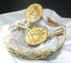 Excellent Antique condition, these are solid 10K gold cuff links and well made. They are attributed to OC Tanner, Co.   Rare image of working horses.  They are oval and measure 3/4" x 1/2". The face of the cuff links is solid 10K gold and is marked 10K,  the toggle and post are 1/20 of 12k gold filled.  They weigh 11 grams.  I would hate to see these melted and thought they would also make some great earrings!  These belonged to my grandfather. OC Tanner is an employee recognition company. My grandfather was a livery man and landscape contractor. He may have been awarded them for one the large projects he worked on Washington, DC. , such as the Masonic Temple.  **Buying jewelry in general can be a scary process, and purchasing online can be even more intimidating. We want you to feel secur Classic Bronze Jewelry For Formal Occasions, Classic Gold Oval Cufflinks, Antique Round Cufflinks For Formal Occasions, Antique Round Cufflinks For Anniversary, Antique Hallmarked Cufflinks For Formal Wear, Antique Hallmarked Cufflinks For Formal Occasion, Antique Hallmarked Cufflinks For Wedding, Antique Cufflinks With Polished Finish, Antique Business Cufflinks With Polished Finish