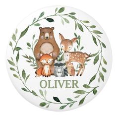 a plate with animals on it and leaves around the edges that says cute woodland animals