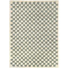 an area rug with checkered design on the front and back, in white and green