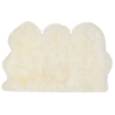 a white sheepskin rug on a white background