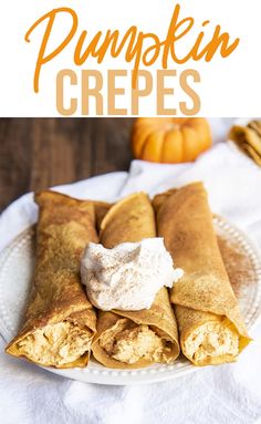 pumpkin crepes on a plate with whipped cream in the middle and an orange pumpkin behind