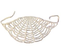 a white basket that is shaped like an animal's tail and has long tails