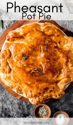 an overhead view of a pie with the words pheasant pot pie on it