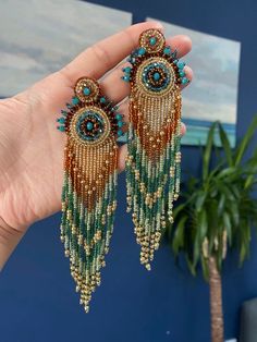 Beaded Fringe Dangle Tassel Earrings For Festival, Bohemian Fringe Tassel Drop Earrings, Bohemian Tassel Earrings With Dangling Beads, Bohemian Tassel Drop Earrings With Fringe, Bohemian Tassel Earrings With Beaded Fringe, Bohemian Fringe Chandelier Earrings As Gifts, Festival Beaded Fringe Chandelier Earrings, Long Drop Festival Earrings With Beaded Fringe, Beaded Fringe Chandelier Earrings For Festivals