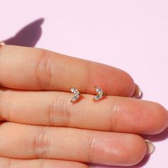 Show off in our tiny dainty Marquise Studs! These gold miniature earrings are a perfect fit for any cartilage piercing or ear lob piercing. SHIPS 1-2 DAYS **Details -A thick layer of 14k Gold layered on .925 sterling silver + e-coat (anti-tarnish) -Stud size: 4mm - Clear CZ -Comes in a single or pair -Post backs -Hypoallergenic: Nickel & Lead Free! If you have any questions do not hesitate to contact us, we will be happy to assist you! Delicate Tiny Cartilage Earrings For Gifts, Delicate Tiny Cartilage Earrings As Gift, Tiny Dainty Rose Gold Earrings, Lob Piercing, Miniature Earrings, Valentines Gift For Her, Earrings Dainty, Cartilage Piercing, Valentines Gift