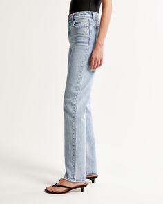 Our 90's-style ultra high rise straight jeans with built-in stretch for superior comfort featuring our highest rise that sits at your natural waist and looks great with your shirt tucked or untucked. With refined details and a vintage feel from top to bottom, this style features a longer-length inseam, light wash and distressed hem. High Rise Flare Jeans For Everyday Summer Wear, Summer Classic Flare Jeans With Straight Hem, Straight Fit Jeans For Everyday Summer Wear, Light Wash Bottoms With Straight Fit And Hem, Summer Relaxed Fit Flare Jeans With Straight Hem, Everyday Summer Jeans With Straight Hem, Straight Hem Jeans For Summer, Light Wash Straight Mom Fit Bottoms, Relaxed Fit Mid-rise Flare Jeans