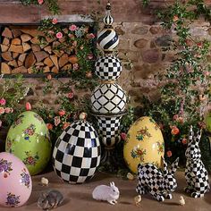 an assortment of decorative easter eggs on display