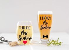 two wine glasses sitting next to each other with the words'future mr and mrs someone'written on them