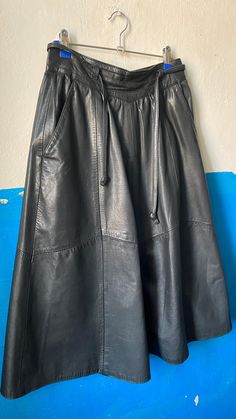 Perfect condition leather lined skirt  Waist line 32cm Leather Lined Midi Skirt, Leather Midi Skirt With Lining, Leather Long Skirt For Fall, Leather Relaxed Fit Lined Skirt, Relaxed Fit Long Leather Skirt, Relaxed Knee-length Leather Skirt, Leather Knee-length Lined Skirt, Womens Skirts, Black Leather Skirts