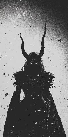 a black and white photo of an animal with horns