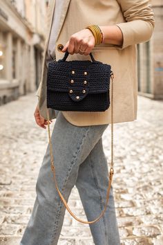 "Meet our navy cross-body bag for women, it is chic and casual with good capacity and an easy carry long leather strap. It will be a beautiful touch to your everyday look. ✔ Our shoulder bag is exclusively handcrafted. ✔ The main material is cotton yarn, we used satin fabric for the lining and pocket. ✔ It comes with 115 cm leather and metal chain strap. ✔ Dimensions : W: 22 cm / 8.6 \" H: 16 cm / 6.3 \" ✂Due to hand work and the nature of the yarn it might show slight measurement and color diff Top Handle Bag With Single Shoulder Strap For On-the-go, Chic Mobile Phone Box Bag For On-the-go, Navy Shoulder Bag With Top Carry Handle For On-the-go, Chic Double Handle Flap Bag With Mobile Phone Holder, Chic Crossbody Flap Bag With Detachable Handle, Chic Travel Shoulder Bag With Adjustable Handle, Crossbody Box Bag For On-the-go, Chic Travel Bag With Single Shoulder Strap, On-the-go Crossbody Box Bag