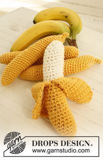 crocheted bananas sitting on top of a table next to each other with the words drops design written below them