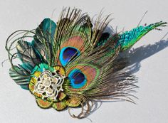 Nice head piece for a tribal costume. Diy Peacock, Peacock Hair Clip, Bride Hair Clips, Steampunk Hairstyles, Peacock Hair, Peacock Colors, Feather Hair Clips, Steampunk Wedding, Peacock Wedding