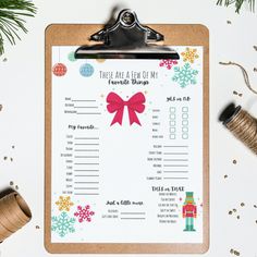 a clipboard with a christmas list on it