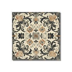 a rug with an ornate design on the front and back side, in beige, black and