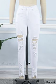 Olivia Mark - Classic White Solid High-Rise Skinny Fit Denim Jeans for Women with Distressed Details White Mid-rise Ripped Jeans, White Stretch Ripped Jeans, High Waist Jeans With Holes For Spring, Stretch Bottoms With Holes For Spring, Jeans Online, Ripped Denim, Women Denim Jeans, White Casual, Wholesale Fashion