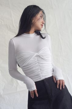 A stretchy, soft cotton top with long sleeves twisted chest with ruched along the body to create flexibility and grace, easy to combine in many different situations. Note:*Processing time takes 7-10 working days (including 3-5 working days for manufacturing and NOT including shipping time)**Backorder Definition- The product is low in stock and in case the customer purchased successfully after out stock, the order will need time to restock.- All of the customizing products will be considered as M Mean Blvd, Top With Long Sleeves, Long Sleeved Top, Dressy Tops, White Outfits, Cotton Top, S Models, Cotton Tops, How To Take Photos