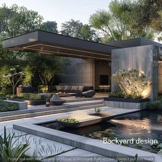 an outdoor living area with water features and landscaping