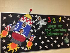 a sign that says blast off to a learning adventure with an image of a rocket ship