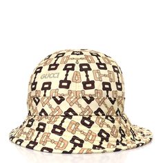 This is an authentic GUCCI New Canvas Horsebit Alina Bucket Hat size M in Beige and Multicolor. This stylish hat is crafted of beige canvas with the classic GG monogram and a brown GG logo on the front. Gg Monogram, Gg Logo, Stylish Hats, Hat Sizes, Bucket Hat, Monogram, Gucci, Hats, ? Logo