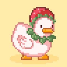 a pixelated image of a duck wearing a santa hat