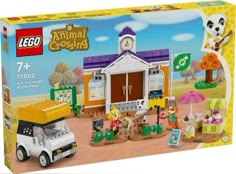 a lego animal crossing set with animals and people in front of the building, including a truck