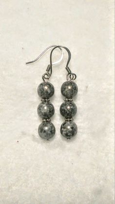 These are light and dark gray swirl glass bead earrings with silver plated spacers. As with all swirl patterns they are all slightly different making every bead and pair of earrings slightly unique. Gray goes with just about anything and can be worn for many different occasions. These would also make really cute gifts for friends and family! Formal Casual Dress, Casual Formal Dresses, Cute Gifts For Friends, Glass Bead Earrings, Up Costumes, Dress Up Costumes, Formal Casual, Swirl Pattern, Bead Earrings