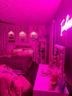 a room with two beds and pink lights on the ceiling, in front of a desk