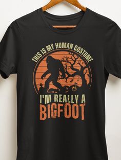 "Bigfoot Halloween t-shirt \"This Is My Human Costume I'm Really A Bigfoot\" Bella Canvas 3001 t shirt This t-shirt is everything you've dreamed of and more. It feels soft and lightweight, with the right amount of stretch. It's comfortable and flattering for all.  * 100% combed and ring-spun cotton (Heather colors contain polyester) * Fabric weight: 4.2 oz/yd² (142 g/m²) * Pre-shrunk fabric * Side-seamed construction * Shoulder-to-shoulder taping * Blank product sourced from Guatemala, Nicaragua Bigfoot Funny, Bigfoot Costume, Sasquatch Shirt, Bigfoot Gifts, Souvenir Shop, Halloween T Shirt, Halloween Tshirts, Honduras, Halloween Shirt