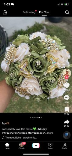 a person holding a bridal bouquet in their hand