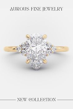 an engagement ring with three pear shaped diamonds on the side and two round brilliant cut diamonds in the middle