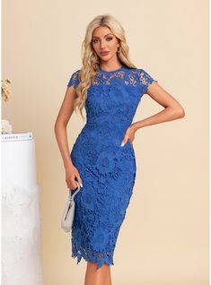 a woman in a blue lace dress